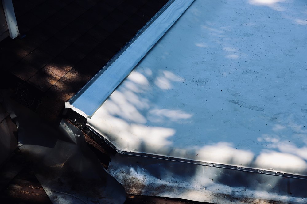 Slide of Bell Roofing