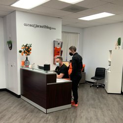 Apnea & Breathing Clinic - Reception desk with Chad & Dr. Lisa.