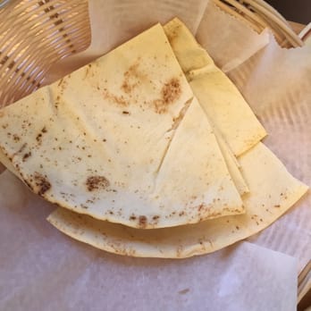 Jerusalem Garden - Pita bread, the best companion of your hummus in the plate. - Desserts Near Me - Ann Arbor, Michigan