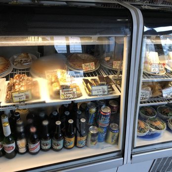 Javadotcup - a display case filled with food and drinks - Asian Fusion Near Me - Prince Rupert, British Columbia
