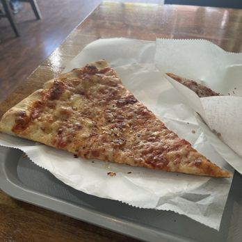 Sister’s Pizza - Slice of cheese pizza. - Pizza Near Me - Jackson Heights, New York Sister’s Pizza - Slice of cheese pizza. - Pizza Near Me - Jackson Heights, New York
