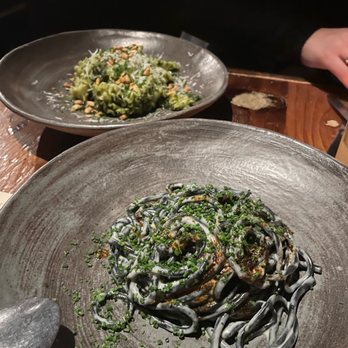 Intero Restaurant - Bucatini with grilled kale, aged gouda, chili oil, chives. Mafaldine with pesto (vegetarian option) - Italian Near Me - Austin, Texas
