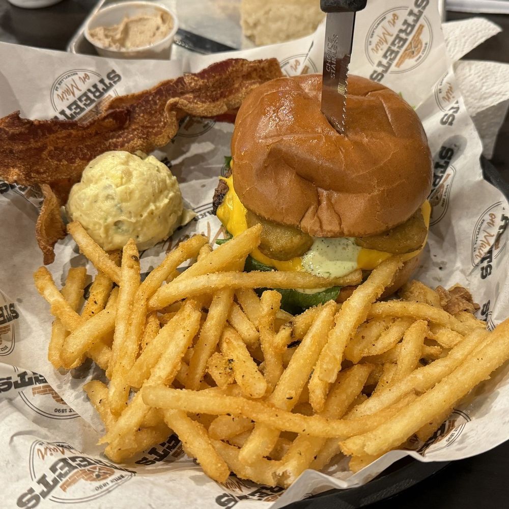 Streets On Main - Fried Pickle Burger, side of bacon, fries and potato salad - American Near Me - Snowflake, Arizona Streets On Main - Fried Pickle Burger, side of bacon, fries and potato salad - American Near Me - Snowflake, Arizona