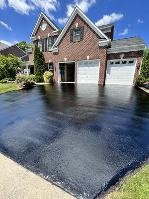 Sealcoating - Call today for your driveway sealcoating needs!