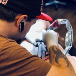 Rushmore Tattoo - LJ putting in work doing some, knot work on the ribs