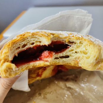 Sultan Bakery - a hand holding a half eaten pastry - Bakeries Near Me - Sultan, Washington Sultan Bakery - a hand holding a half eaten pastry - Bakeries Near Me - Sultan, Washington
