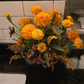 The Pink Door - Fresh flowers in the ladies room. - Italian Near Me - Seattle, Washington The Pink Door - Fresh flowers in the ladies room. - Italian Near Me - Seattle, Washington