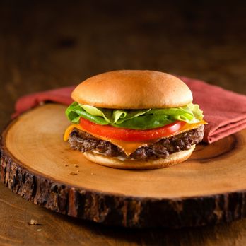 Hero Certified Burgers - Milton - a hamburger with lettuce, tomato, and cheese - Burgers Near Me - Milton, Ontario Hero Certified Burgers - Milton - a hamburger with lettuce, tomato, and cheese - Burgers Near Me - Milton, Ontario