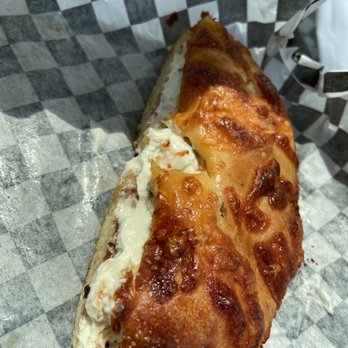 Bagel Cafe - Jalapeño Cheddar bagel with scallion cream cheese - Bagels Near Me - Pawleys Island, South Carolina