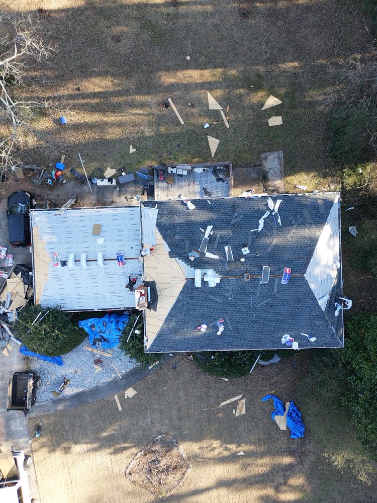 Slide of Super Roofing Pros