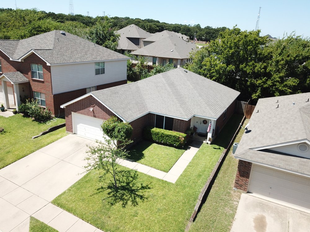 Slide of Breeze Roofing & Restoration