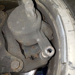 Missing bolt from left caliper that was causing noise