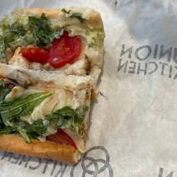 Union Kitchen Grocery - Half of the Chicken Pesto Sub. Flat and pathetic size for $14 sandwich.