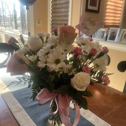 Christiana Flower & Gifts - New arrangement we received this morning. Notice I had to remove old balloon from old arrangement because they didn't replace those .