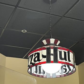 Pizza Hut - a light fixture hanging from the ceiling - Pizza Near Me - Boynton Beach, Florida