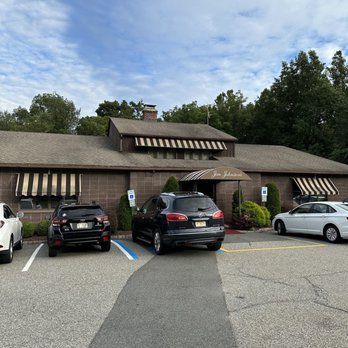 Jim Johnston's Steakhouse - cars parked in front of the restaurant - Steakhouses Near Me - Roseland, New Jersey