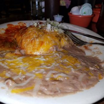 Tenampa - Adovada stuffed sopa, I skipped the rice, so they dished up additional refried beans. - New Mexican Cuisine Near Me - Albuquerque, New Mexico Tenampa - Adovada stuffed sopa, I skipped the rice, so they dished up additional refried beans. - New Mexican Cuisine Near Me - Albuquerque, New Mexico