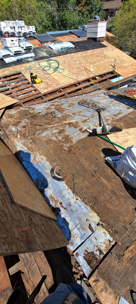 Slide of Mendoza & M  Roofing