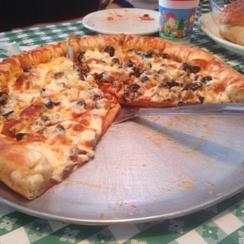 Hometown Pizza - Meat Madness ! We added olives and pineapple with a stuffed crust ! - Pizza Near Me - Omak, Washington Hometown Pizza - Meat Madness ! We added olives and pineapple with a stuffed crust ! - Pizza Near Me - Omak, Washington