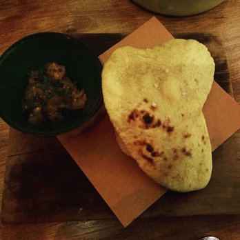 Olmsted - Naan with poached pear. - New American Near Me - Brooklyn, New York