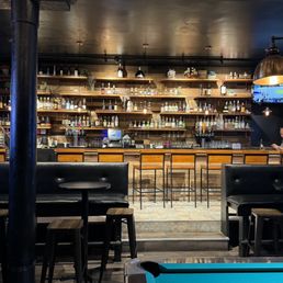 a man sitting at a bar a man sitting at a bar