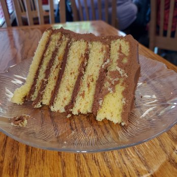 Gerry Frank's Konditorei - "Afterschool" classic cake. A yellow cake with milk chocolate buttercream. Very good. - Desserts Near Me - Salem, Oregon Gerry Frank's Konditorei - "Afterschool" classic cake. A yellow cake with milk chocolate buttercream. Very good. - Desserts Near Me - Salem, Oregon