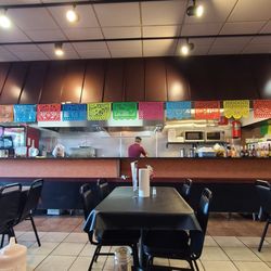 Taqueria Cinco Hermanos - Seating and the open kitchen