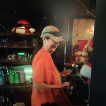 The Loading Pen - Shari the owner and bartender having a good time, serving her customers. - Bars Near Me - Downey, Idaho