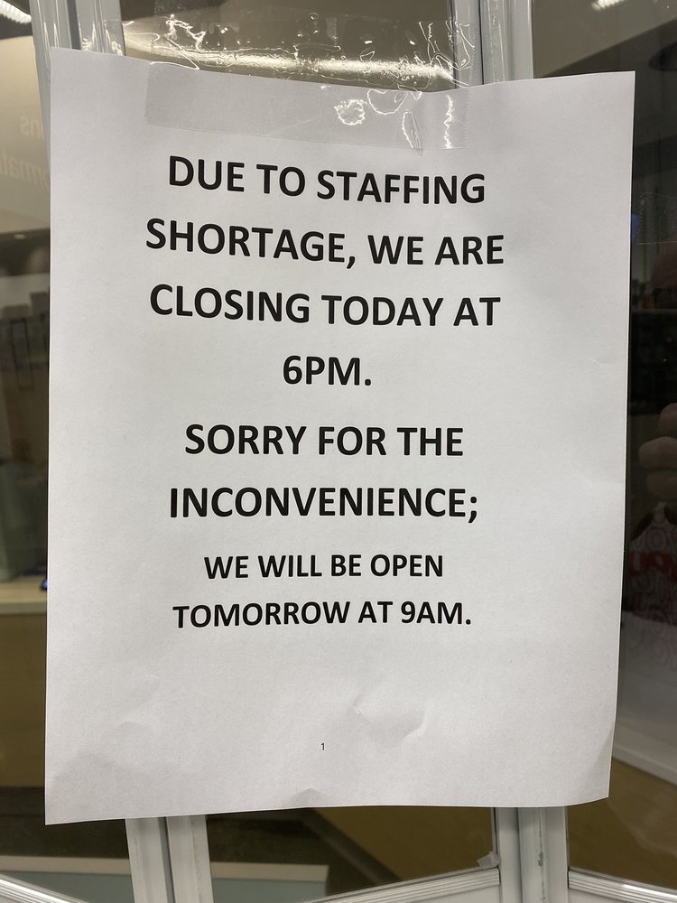 Sign at pharmacy that opening hours until 9pm Yelp