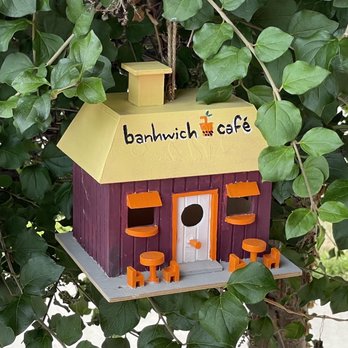 Banhwich Cafe - This little house is in the bushes next to the outside tables. Outstanding! - Sandwiches Near Me - Lincoln, Nebraska