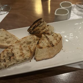 Sixty Vines - The toasted bread with white oil and vinegar - New American Near Me - Charlotte, North Carolina Sixty Vines - The toasted bread with white oil and vinegar - New American Near Me - Charlotte, North Carolina