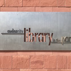 Cedar City Public Library - The sign out front on the side of the building. Photo taken 16 Sep 2017.