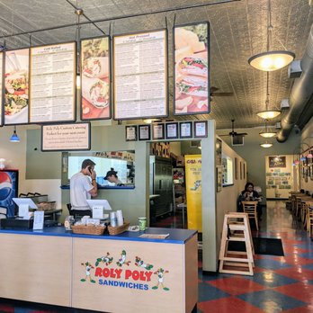 Roly Poly Terre Haute - a restaurant counter with menus - Sandwiches Near Me - Terre Haute, Indiana Roly Poly Terre Haute - a restaurant counter with menus - Sandwiches Near Me - Terre Haute, Indiana