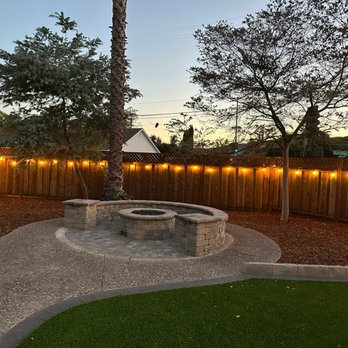Universal Pavers And Landscaping - day view of new sitting wall with pavers kit gas fire pit - Masonry/Concrete Near Me Universal Pavers And Landscaping - day view of new sitting wall with pavers kit gas fire pit - Masonry/Concrete Near Me