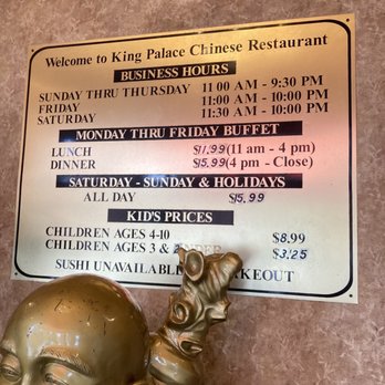 King Palace Chinese Restaurant - a statue of a laughing man - Chinese Near Me - Houston, Texas