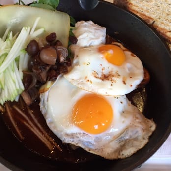 Chambar - An amazing Fricassé: braised short ribs with fried eggs watercress, potatoes, and smoked cheddar - Belgian Near Me - Vancouver, British Columbia