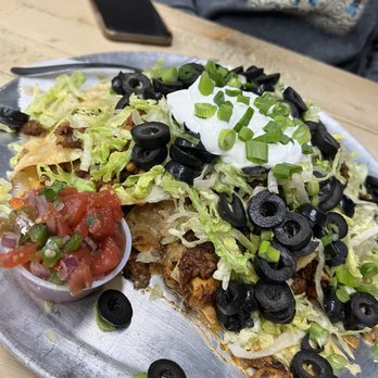 Krootz Brewing Company - Badass Nachos with beef and chicken (no jalapeños and pico on the side" - Brewpubs Near Me - Gainesville, Texas