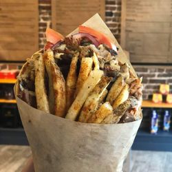 The Fat Greek - Gyro wrapped in Pita with Tzatziki, Tomatoes, Onions & Fries