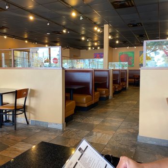 Keke's Breakfast Cafe - a person reading a menu - American Near Me - Bradenton, Florida Keke's Breakfast Cafe - a person reading a menu - American Near Me - Bradenton, Florida