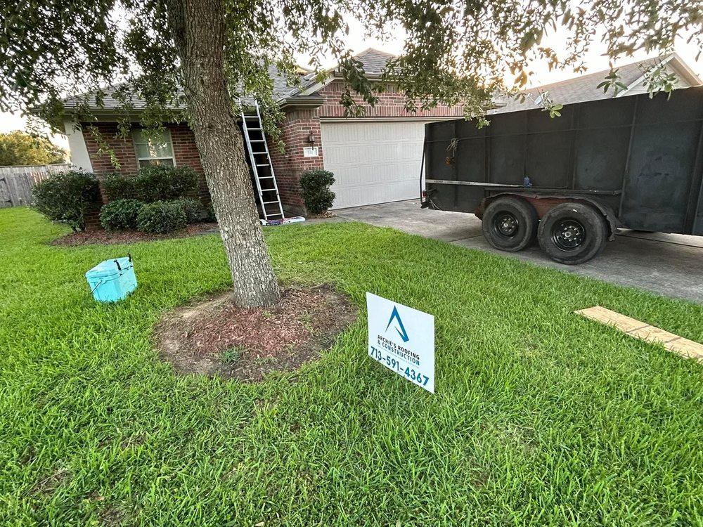 Slide of Archie's Roofing & Construction