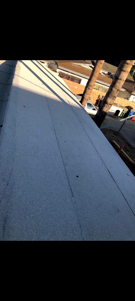 Slide of Y&V Roofing and Tearoff