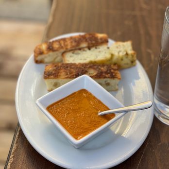 Caffe Sport - Orange dipping sauce and bread - Italian Near Me - San Francisco, California Caffe Sport - Orange dipping sauce and bread - Italian Near Me - San Francisco, California