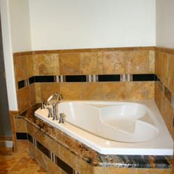 Davis Flooring - Custom tub surround and tile with epoxy grout.