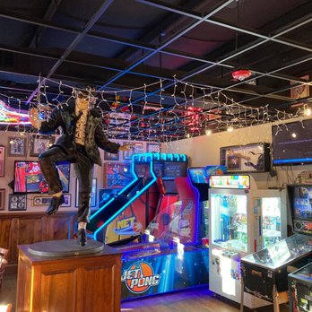 Macado's - a statue of a man jumping over a bar - Burgers Near Me - Harrisonburg, Virginia Macado's - a statue of a man jumping over a bar - Burgers Near Me - Harrisonburg, Virginia