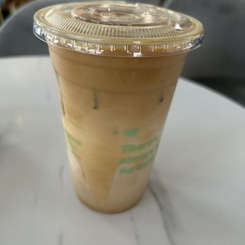 Un Attimo Coffee - Iced vanilla and caramel latte - Coffee & Tea Near Me - Plantation, Florida Un Attimo Coffee - Iced vanilla and caramel latte - Coffee & Tea Near Me - Plantation, Florida