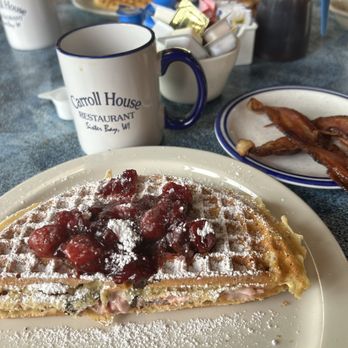 Carroll House Restaurant - Half cherry stuffed waffle, bacon and coffee - New American Near Me - Sister Bay, Wisconsin Carroll House Restaurant - Half cherry stuffed waffle, bacon and coffee - New American Near Me - Sister Bay, Wisconsin