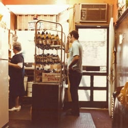 Moe's Italian Sandwiches of Portsmouth - This photo was taken from the back table of the Original Moe's Sandwich Shop c1967. That is Rosa Pagano making the sandwich.