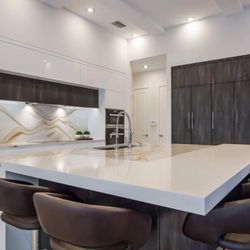 Tile & Stone of Italy - Cambria Quartz countertops with Pompeii Pure White mitered highbar