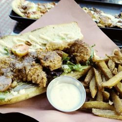 Station on Jasper - Bourbon brined, buttermilk fried po'boy with fries.