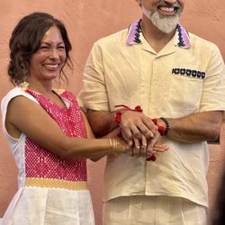 Our linen wedding outfits that were hemmed, washed, and pressed by the wonderful staff at Magic Touch.